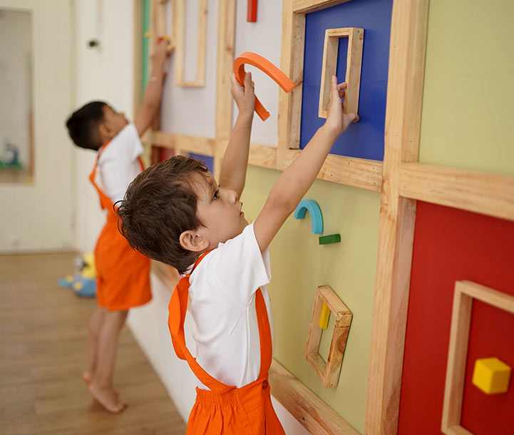 Child playing with building blocks